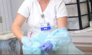 nurse in protective gear