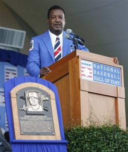 National Baseball Hall of Fame inductee Pedro Martinez speaks during an induction ceremony at the Clark Sports Center on Sunday, July 26, 2015, in Cooperstown, N.Y. (AP Photo/Mike Groll)