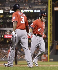 Washington Nationals' Danny Espinosa, right, is congratulated by Michael Taylor (3) after hitting a home run against the San Francisco Giants in the ninth inning of a baseball game Saturday, Aug. 15, 2015, in San Francisco. (AP Photo/Ben Margot)