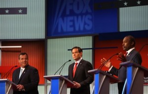 Republican presidential candidates from left, Chris Christie, Marco Rubio and Ben Carson take the stage for the first Republican presidential debate at the Quicken Loans Arena Thursday, Aug. 6, 2015, in Cleveland. (AP Photo/Andrew Harnik)