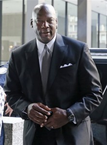 Basketball Hall of Famer Michael Jordan arrives at the federal courthouse in Chicago Tuesday, Aug. 18, 2015. Jordan is expected to take the stand in his case against a now-defunct grocery store chain that used his image without permission. (AP Photo/Christian K. Lee)