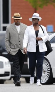 Leolah Brown walks towards media members after leaving a funeral service for her niece, Bobbi Kristina Brown, Saturday, Aug. 1, 2015, in Alpharetta, Ga. Bobbi Kristina, the only child of Whitney Houston and R&B singer Bobby Brown, died in hospice care July 26, about six months after she was found face-down and unresponsive in a bathtub in her suburban Atlanta townhome. (AP Photo/John Bazemore)