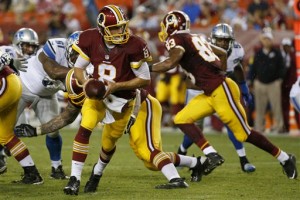 Washington Redskins quarterback Kirk Cousins (8) turns out of the pocket during the second half of an NFL preseason football game against the Detroit Lions in Landover, Md., Thursday, Aug. 20, 2015. The Washington Redskins defeated the Detroit Lions 21-17. (AP Photo/Alex Brandon)