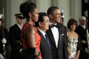 In this Jan. 19, 2011, file photo, President Barack Obama and first lady Michelle Obama welcome China's President Hu Jintao to the North Portico of the White House in Washington for a State Dinner. China will get its second state dinner under President Barack Obama when its leader, Xi Jinping, arrives at the White House on Friday. That leaves an entity viewed all over the world as the ultimate in entertaining perfection grappling with a basic question: How to make this dinner better than the last one? A state dinner is the glitzy end to a state visit, a high honor usually reserved for long-standing and close U.S. allies. That makes the double honor especially unique for China, as the two nations continue to differ on several issues including human rights and cyber security. (AP Photo/Carolyn Kaster, File)