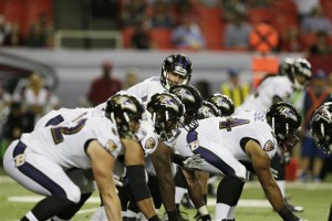 Baltimore Ravens quarterback Matt Schaub (8) calls a play on the line of scrimmage against the Atlanta Falcons during the first half of an NFL football preseason game, Thursday, Sept. 3, 2015, in Atlanta. (AP Photo/Brynn Anderson )
