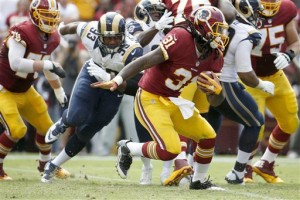 Washington Redskins running back Matt Jones (31) carries the ball during the first half of an NFL football game against the St. Louis Rams in Landover, Md., Sunday, Sept. 20, 2015. (AP Photo/Alex Brandon)