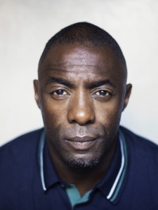 In this Monday, Sept. 14, 2015 photo, Idris Elba poses for a portrait in promotion of his upcoming film "Beasts of No Nation" at the 2015 Toronto International Film Festival in Toronto. The film, in which a young West African boy (Abraham Attah, an unprofessional 15-year-old actor from Ghana) is orphaned by war and enlisted into a rebel army led by Elba’s Commandant, was acquired by Netflix to be its first original film.  (Photo by Victoria Will/Invision/AP)