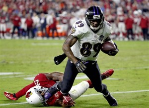 Baltimore Ravens wide receiver Steve Smith (89) makes a catch as Arizona Cardinals cornerback Patrick Peterson (21) defends during the second half of an NFL football game, Monday, Oct. 26, 2015, in Glendale, Ariz. The Cardinals won 26-18. (AP Photo/Ross D. Franklin)