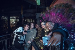 In this Sept. 17, 2015 photo released by Sony Music, members of Bomba Estereo, from left, Simon Mejia, Julian Salazar, Andres Zea and Liliana Saumet pose for a selfie with actor-singer Will Smith, who appears on a remix to Colombian band Bomba Estereos song, Fiesta. The remix was released digitally Friday, Oct. 2. The collaboration marks Smiths return to music since his 2005 album, Lost and Found. Smith discovered Bomba Estereo, known for its blend of Latin, tropical and electro sounds, on a recent trip to Colombia. He then asked the group to collaborate. (Alan Silfen/Sony via AP)