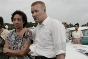 In this Sept. 29, 2015 photo provided by Big Beach Films, Joel Edgerton, right, and Ruth Negga, as Richard and Mildred Loving, stand on the set of the movie "Loving," being shot in the Richmond Va. area. Nearly 60 years after a Virginia couple defied a state law prohibiting interracial marriage, starting a battle that eventually overturned such laws nationwide, their story is heading to the big screen. (Ben Rothstein/Big Beach Films via AP)