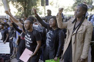 University California Los Angeles students stage a protest rally in a show of solidarity with protesters at the University of Missouri, Thursday, Nov. 12, 2015 in Los Angeles. Thousands of students across the U.S. took part in demonstrations at university campuses Thursday to show solidarity with protesters at the University of Missouri, and to shine a light on what they say are racial problems at their own schools. (AP Photo/Nick Ut)