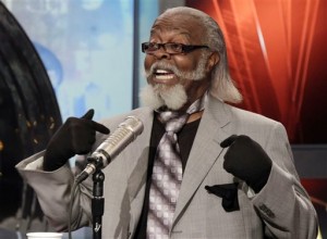 In this Thursday, Oct. 28, 2010, file photo, Jimmy McMillan, candidate for governor of New York, of the Rent is Too Damn High Party, appears on the "Imus in the Morning" program on the Fox Business Network, in New York. The New York Times reports McMillan has announced his retirement from politics, citing a lack of support for his agenda. McMillan said in a news release dated Tuesday, Dec. 8, 2015, that voters were totally brainwashed and criticized elected officials for not securing rent reduction for city residents. (AP Photo/Richard Drew, File)
