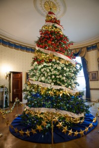WASHINGTON, D.C. — On December 2, 2015, First Lady Michelle Obama hosted a preview of the 2015 holiday decor at the White House.  After delivering remarks in the East Room, the First Lady was joined in the State Dining Room by White House Executive Chef Cris Comerford, White House Executive Pastry Chef Susan Morrison, and White House Chief Floral Designer Roshan Ghaffarian, who will demonstrate holiday crafts and treats.As part of the Joining Forces initiative, the First Lady welcomed military families to the White House for the first viewing of the 2015 holiday decorations. As in years past, many of the White House holiday decorations honored military families.©2015 Photo by Cheriss May, www.cherissmay.com