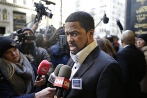 Pastor Darrell Scott of the New Spirit Revival Center in Ohio speaks to reporters outside of Trump Tower in New York, Monday, Nov. 30, 2015. Trump is scheduled to meet with a coalition of 100 African-American evangelical pastors and religious leaders in a private meeting Monday at Trump Tower. (AP Photo/Seth Wenig)