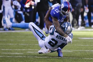 New York Giants wide receiver Odell Beckham (13) and Carolina Panthers' Josh Norman (24) play during the first half of an NFL football game Sunday, Dec. 20, 2015, in East Rutherford, N.J. (AP Photo/Julie Jacobson)