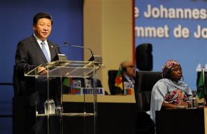 Chinese President Xi Jinping delivers his speech during the opening ceremony of the Johannesburg Summit for the Forum on China-Africa Cooperation at the Sandton Convention Centre in Johannesburg, Friday Dec. 4, 2015. Jinping said that every time he visited Africa, he saw new progress and new changes on this continent. (AP Photo)