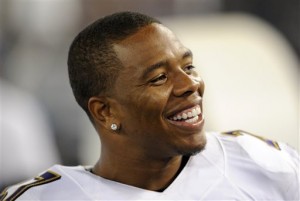 In this Aug. 7, 2014, file photo, Baltimore Ravens running back Ray Rice smiles on the sideline during the second half of a preseason NFL on football game against the San Francisco 49ers in Baltimore. The  Ravens running back will be serving as an assistant running backs coach for Mike Martz this week at the NFLPA Collegiate Bowl. Rice has not played in the NFL since being suspended at the start of the 2014 season for domestic violence. (AP Photo/Nick Wass, File)
