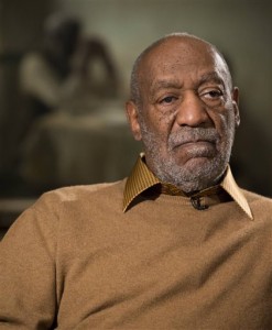 In this Nov. 6, 2014 file photo, entertainer Bill Cosby pauses during an interview in Washington about an upcoming exhibit that will feature some of his art collection at the Smithsonian's National Museum of African Art. Cosby was charged Wednesday, Dec. 30, 2015, with drugging and sexually assaulting a woman at his home in January 2004. They are the first criminal charges brought against the comedian out of the torrent of allegations that destroyed his good-guy image as Americas Dad. (AP Photo/Evan Vucci, File)