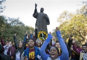 Huston-Tillotson University students cheer during a celebration at the University of Texas at Austin on Martin Luther King Jr. Day on Monday, Jan. 18, 2016.  Thousands marched from the statue to the Capitol. (Jay Janner/Austin American-Statesman via AP)