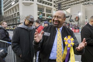 Philadelphia Mayor Michael Nutter acknowledges the grandstand crowd outside City Hall during the 116th annual Mummers Parade in Philadelphia on Friday, Jan. 1, 2016. (Ed Hille /The Philadelphia Inquirer via AP)  PHIX OUT; TV OUT; MAGS OUT; NEWARK OUT; MANDATORY CREDIT