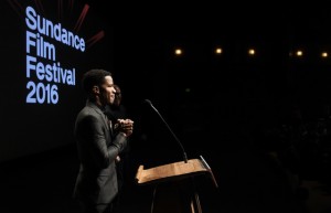 Nate Parker, the director, star and producer of "The Birth of a Nation," takes the stage to introduce his film onstage at the premiere of the film at the Eccles Theatre during the 2016 Sundance Film Festival on Monday, Jan. 25, 2016, in Park City, Utah. (Photo by Chris Pizzello/Invision/AP)