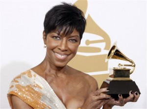 In a Sunday, Feb. 8, 2009 file photo, Natalie Cole holds the best instrumental arrangement accompanying vocalist award backstage at the 51st Annual Grammy Awards, in Los Angeles. Cole, the daughter of jazz legend Nat "King" Cole who carried on his musical legacy, died Thursday night, Dec. 31, 2015, according to publicist Maureen O'Connor. She was 65. (AP Photo/Matt Sayles, File)