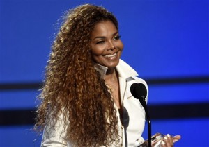 FILE - In this June 28, 2015, file photo, Janet Jackson accepts the ultimate icon: music dance visual award at the BET Awards in Los Angeles. Jackson announced Wednesday, Jan. 6, 2016, that she's recovering from an unspecified illness. In a two-minute video on Twitter, Jackson posted a clip from her song "The Great Forever" followed by a personal message "My doctors have approved my concerts as scheduled in Europe, and as I promised, the postponed shows will be rescheduled. Thank you for your prayers and love," the singer wrote. (Photo by Chris Pizzello/Invision/AP, File)