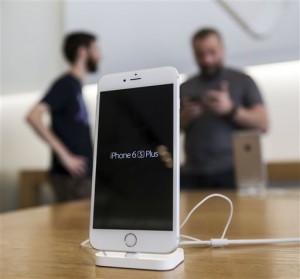 An Apple iPhone 6s Plus smartphone is displayed Friday, Sept. 25, 2015 at the Apple store at The Grove in Los Angeles.  On Wednesday, Feb. 17, 2016, a federal judge ordered Apple Inc. to help the FBI hack into an encrypted iPhone used by Syed Farook, who along with his wife, Tashfeen Malik, killed 14 people in December in the worst terror attack on U.S. soil since Sept. 11, 2001.  Apple has helped the government before in this and previous cases, but this time Apple CEO Tim Cook said no and Apple is appealing the order. (AP Photo/Ringo H.W. Chiu)