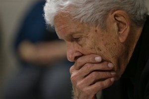 Paul Schrade, who was shot in the head by Sirhan Sirhan, reacts during a parole hearing for Sirhan Wednesday, Feb. 10, 2016, at the Richard J. Donovan Correctional Facility in San Diego. For the 15th time, officials denied parole for Sirhan Sirhan, the assassin of Sen. Robert F. Kennedy, after hearing Wednesday from another person who was shot that night and called for the release of Sirhan. (AP Photo/Gregory Bull, Pool)