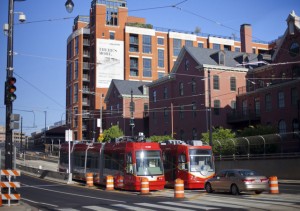 A pair of new streetcars, made in Clackamas, Ore., and the Czech Republic at the cost of $4 million each, sit parked at the bottom of Hopscotch Bridge near Union Station, Sunday, April 27, 2014 in Washington. The 2.4-mile streetcar route runs up and down H street and Benning Road NW, and runs over the bridge to connect to Union Station. Since December, the Washington District of Transportation (DDOT) has been testing the electrified vehicles along the route in anticipation of opening for service later this year. (AP Photo/Pablo Martinez Monsivais)