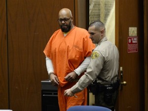 In this April 30, 2015 file photo, Marion "Suge" Knight is escorted into court for his arraignment on murder charges in Los Angeles. Court records show a Los Angeles judge on Friday, Jan. 29, 2016, cut off Knight's access to phone calls, visitors and mail from anyone except his attorneys at the request of sheriff's investigators.  (Kevork Djansezian/Pool Photo via AP, File )