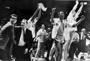 In this March 19, 1966, file photo, Texas Western basketball coach Don Haskins, second from left, and players celebrate after winning the NCAA basketball championship in College Park, Md. Fifty years ago, Texas Western started five blacksWillie Worsley, Orsten Artis , Bobby Joe Hill, David "Big Daddy" Lattin and Harry Flournoyagainst Kentucky in the NCAA championship game. Today, after reading historical recaps and watching movies, people tend to think it was an immediate watershed moment in sports and civil rights. It wasn't. (AP Photo/File)