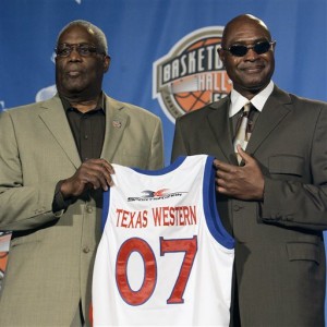 In this April 2, 2007, file photo, Harry Flournoy, left, and David Lattin, members of the 1966 NCAA-champion Texas Western basketball team,  hold their jerseys after being named members of the Naismith Memorial Hall of Fame Class of 2007 in Atlanta. Fifty years ago, Texas Western started five blackWillie Worsley, Orsten Artis, Bobby Joe Hill, Lattin and Flournoyagainst Kentucky in the NCAA championship game on March 19, 1966 at Cole Field House in College Park, Md. (AP Photo/Gerry Broome, File)