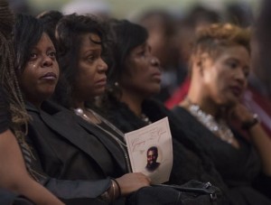 Kimberly Gunn, sister of Gregory Gunn, looks on during the funeral service for Gregory Gunn at True Divine Baptist Church in Montgomery, Ala., Saturday, March 5, 2016. Gregory Gunn was fatally shot by Montgomery Police Officer Aaron Smith on Feb. 25. Smith has been arrested. (Albert Cesare/The Montgomery Advertiser via AP) MANDATORY CREDIT