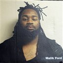 This image provided by Prince George's County police shows Malik Ford, one of the three suspects involve in the shooting of Prince George's County police officer Jacai Colson. The gunman, Michael Ford, 22, was expected to survive, along with his brothers Malik, 21, and Elijah, 18. All three have been arrested and will face dozens of charges between them according to police. (Prince Georges' County Police via AP)