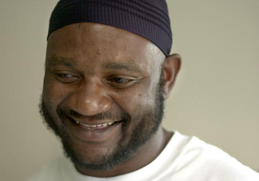 In this April 15, 2004 file photo, Darryl Hunt smiles after learning that he has been granted a pardon in the 1984 murder of Deborah Sykes. Hunt spent 19 years behind bars for a murder he didn't commit. He was recently diagnosed with cancer before he died of what police believe was a self-inflicted gunshot wound, a friend and minister said Wednesday, March 16, 2016. (Megan Morr/Winston-Salem Journal via AP, File)