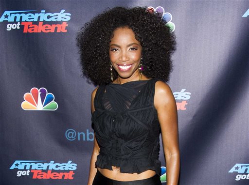 In this Sept. 18, 2013 file photo, Heather Headley walks the post-show red carpet for the finale of "America's Got Talent" in New York. Headley will replace Jennifer Hudson in Broadways current revival of The Color Purple. (Photo by Charles Sykes/Invision/AP, File)