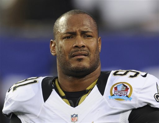 In this Dec. 9, 2012, file photo, New Orleans Saints defensive end Will Smith appears before an NFL football game against the New York Giants in East Rutherford, N.J. Smith was fatally shot after a traffic accident in New Orleans. (AP Photo/Bill Kostroun, File)