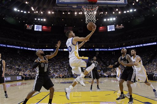 Golden State Warriors' Stephen Curry during  an NBA basketball game against the San Antonio Spurs Thursday, April 7, 2016, in Oakland, Calif. (AP Photo/Marcio Jose Sanchez)