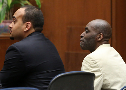 Michael Jace, who played a police officer on the TV series, "The Shield," appears in court with his attorney, attorney Jason Sias, left, during his trial, Tuesday, May 31, 2016, at Los Angeles County Superior in Los Angeles. A jury convicted Jace of second-degree murder, Tuesday, in the 2014 shooting death of his wife. (AP Photo/Anthony McCartney)