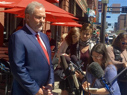 Attorney William Mauzy answers questions from the media as he arrives at his Minneapolis office Wednesday, May 4, 2016. A published report says Prince's representatives arranged for the musician to meet a California doctor to help him kick an addiction to painkillers shortly before his death. Mauzy represents California Dr. Howard Kornfeld who couldn't immediately meet Prince so he sent his son Andrew to discuss treatment. The pop rock singer died on April 21 at the age of 57.  (AP Photo/ Jeff Baenen)