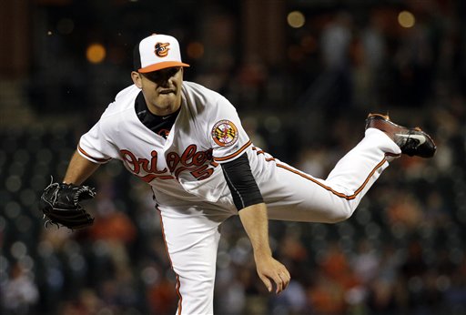 Baltimore Orioles relief pitcher Brian Duensing throws to the Boston Red Sox during a baseball game in Baltimore, Thursday, June 2, 2016. (AP Photo/Patrick Semansky)