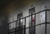 As states expand vaccines, prisoners still lack access