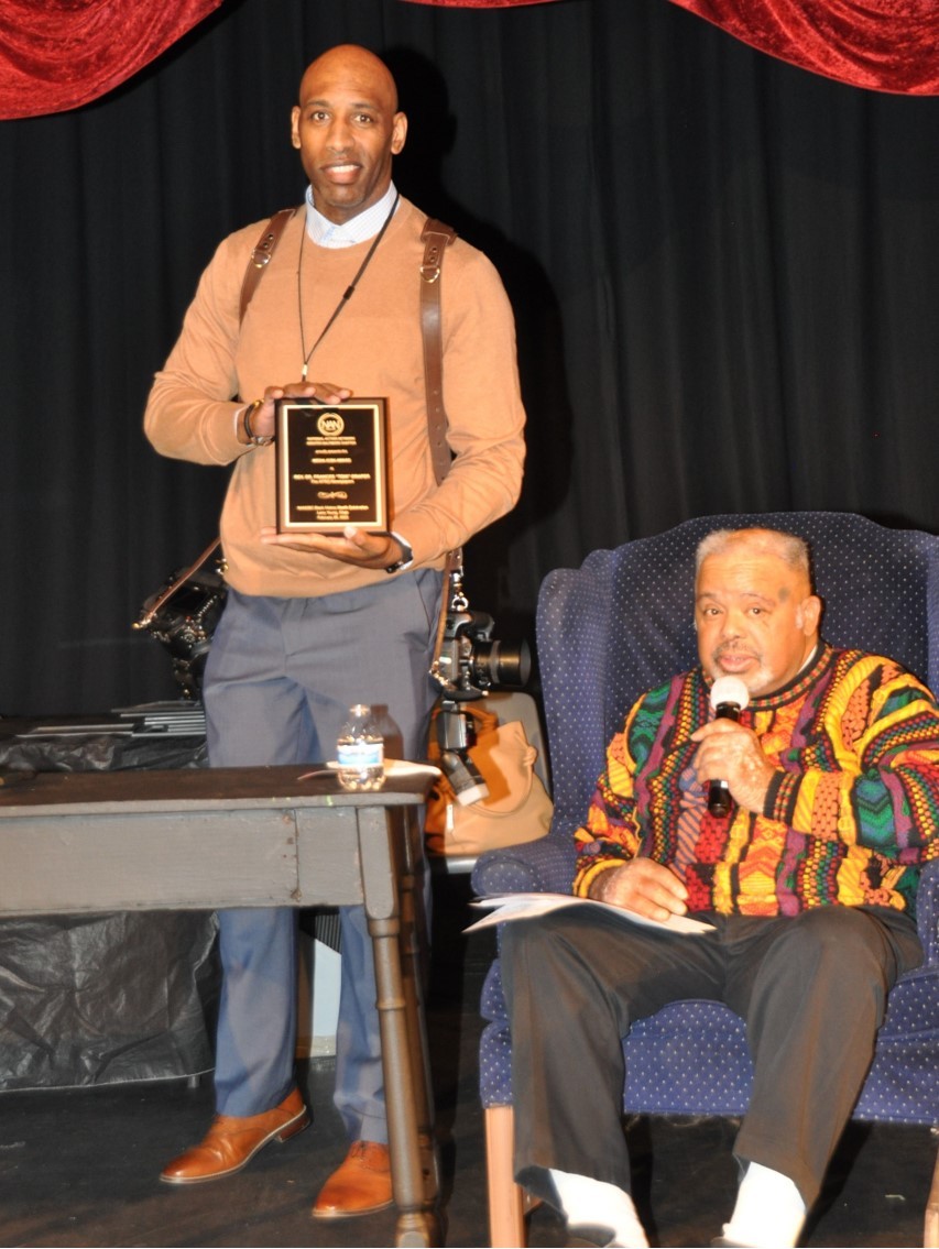 J.J. McQueen Afro Photographer recieving Media Icon Award on behalf of ...